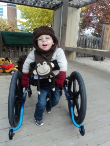 Seb in his walker at school